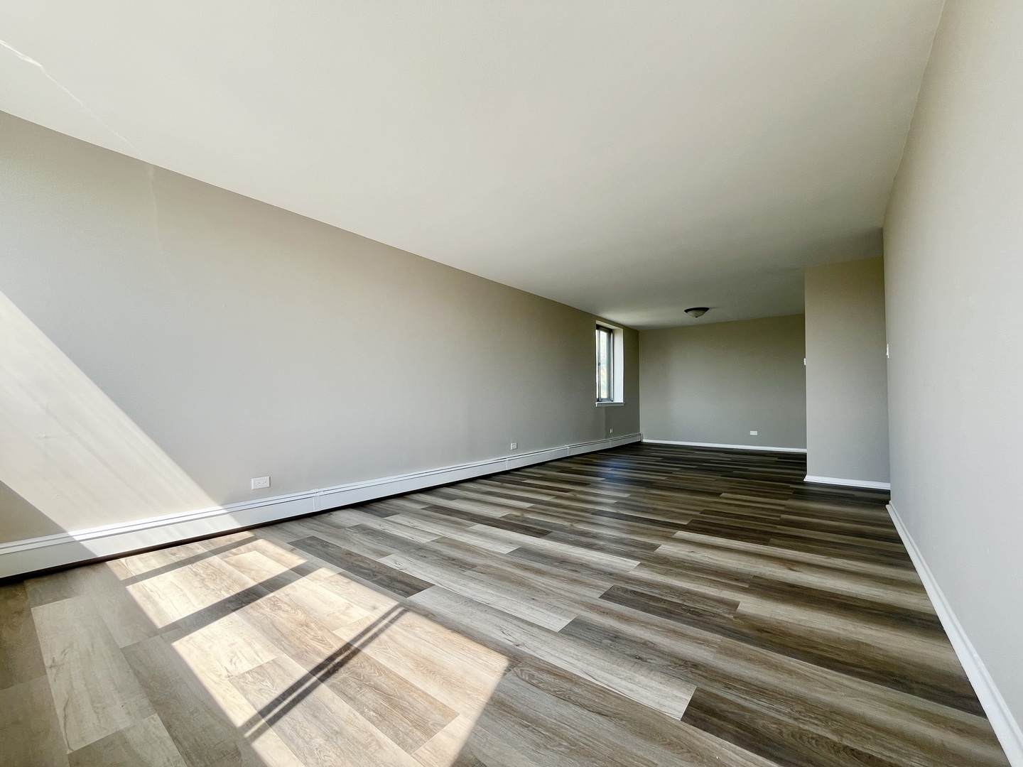 9725 Karlov Avenue, Unit 501 Oak Lawn, IL 60453 - Photo 5 of 17 a view of an empty room and window
