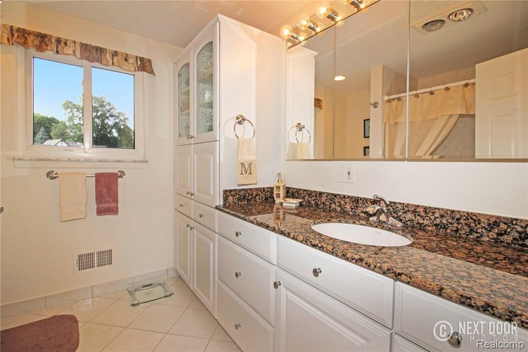 5156 24 Mile Road Utica, MI 48316 - Photo 12 of 20 updated spacious guest bathroom.