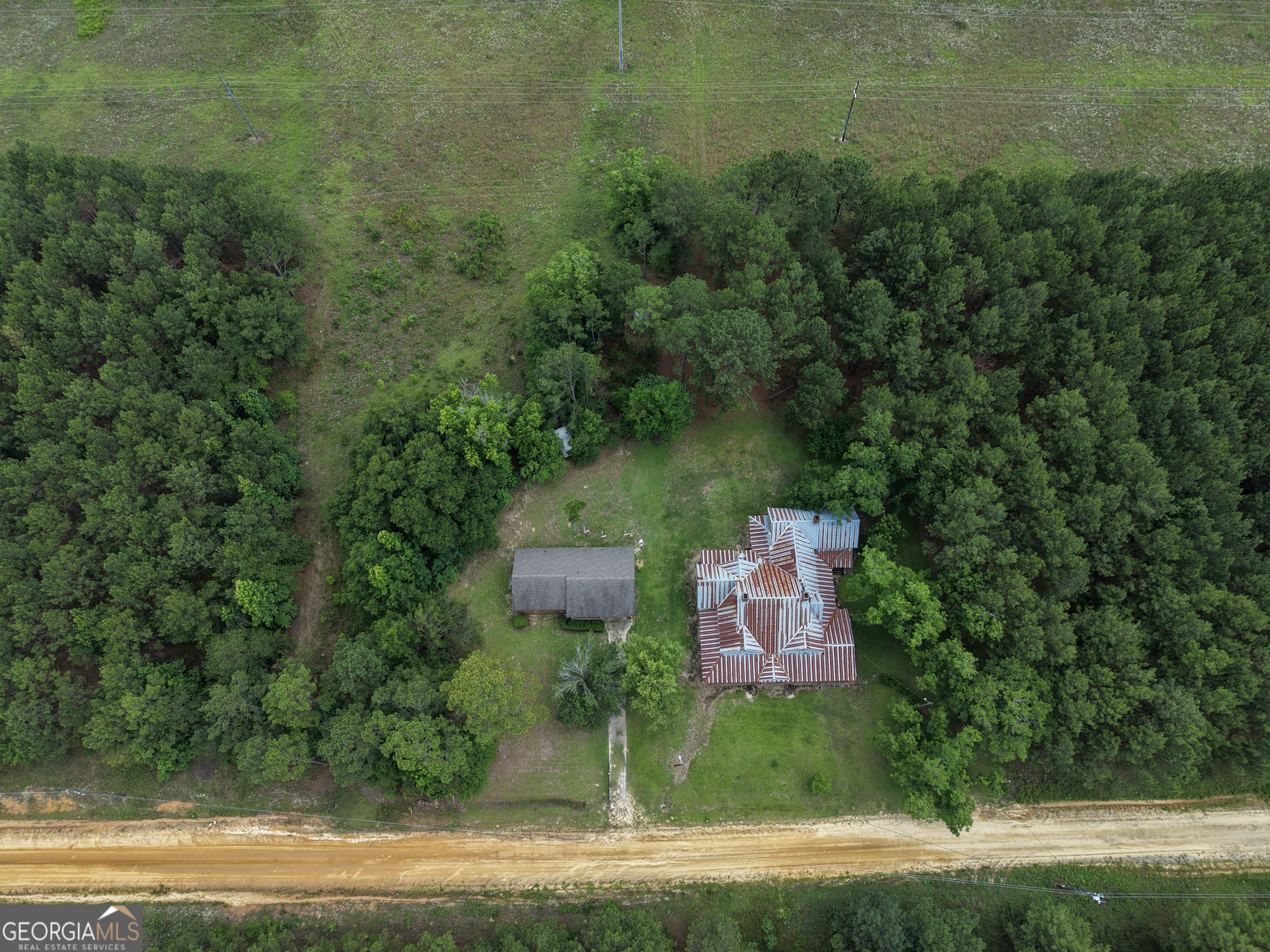 1869 Minter Blue Springs Road Rockledge, GA 30454 - Photo 3 of 45 a view of a house with a yard