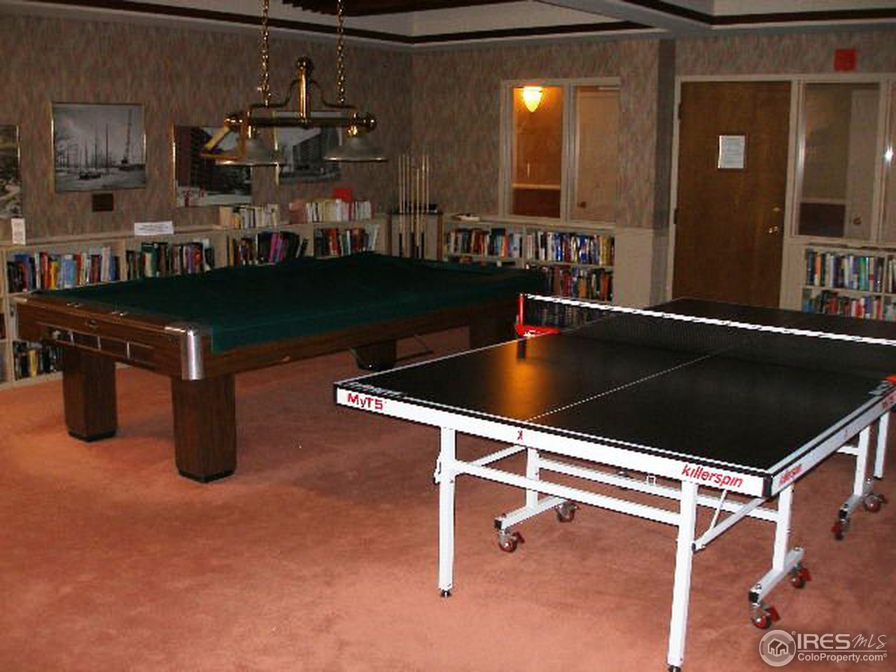 1850 Folsom Street, Unit 1007 Boulder, CO 80302 - Photo 11 of 13 a kitchen with table and chairs