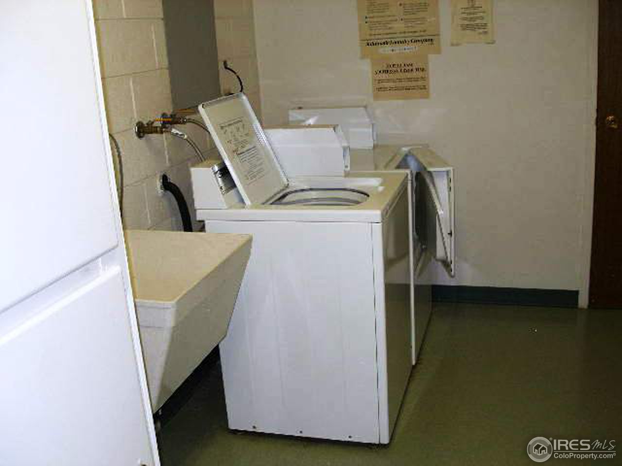 1850 Folsom Street, Unit 1007 Boulder, CO 80302 - Photo 7 of 13 a utility room with dryer and washer