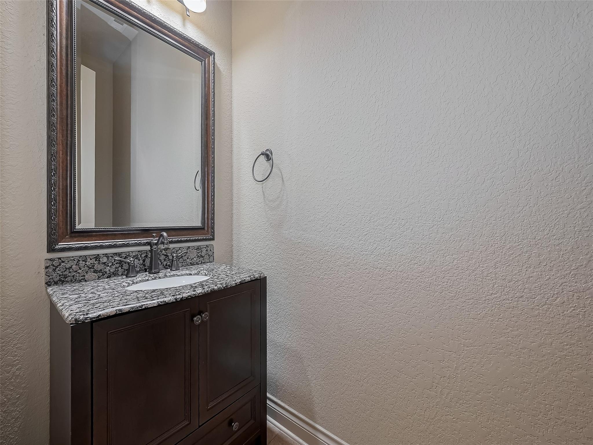 2711 King Point View Lane Spring, TX 77388 - Photo 39 of 48 The powder room is just off the mud room areas coming in from the garage.