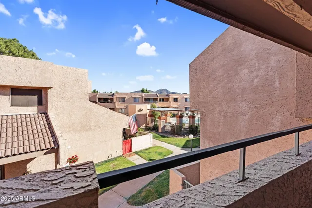 a view of swimming pool with seating area