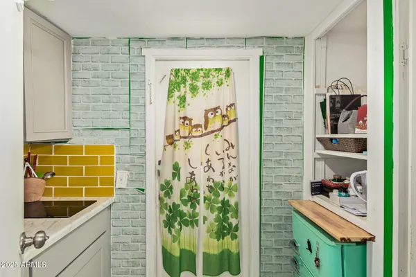 a bathroom with a sink and a shower