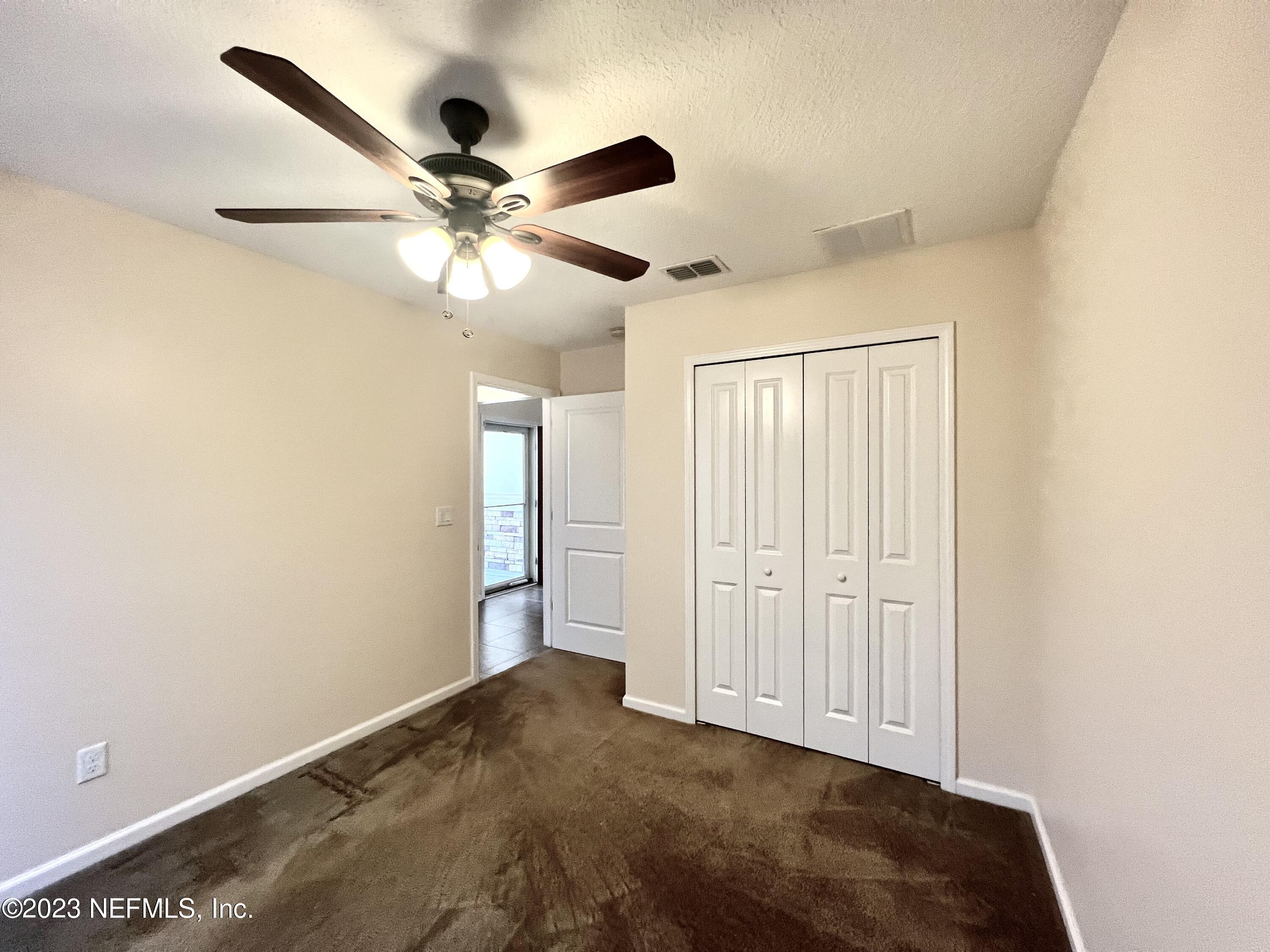 120 East Franchetta Lane St. Augustine, FL 32092 - Photo 16 of 25 a view of an empty room
