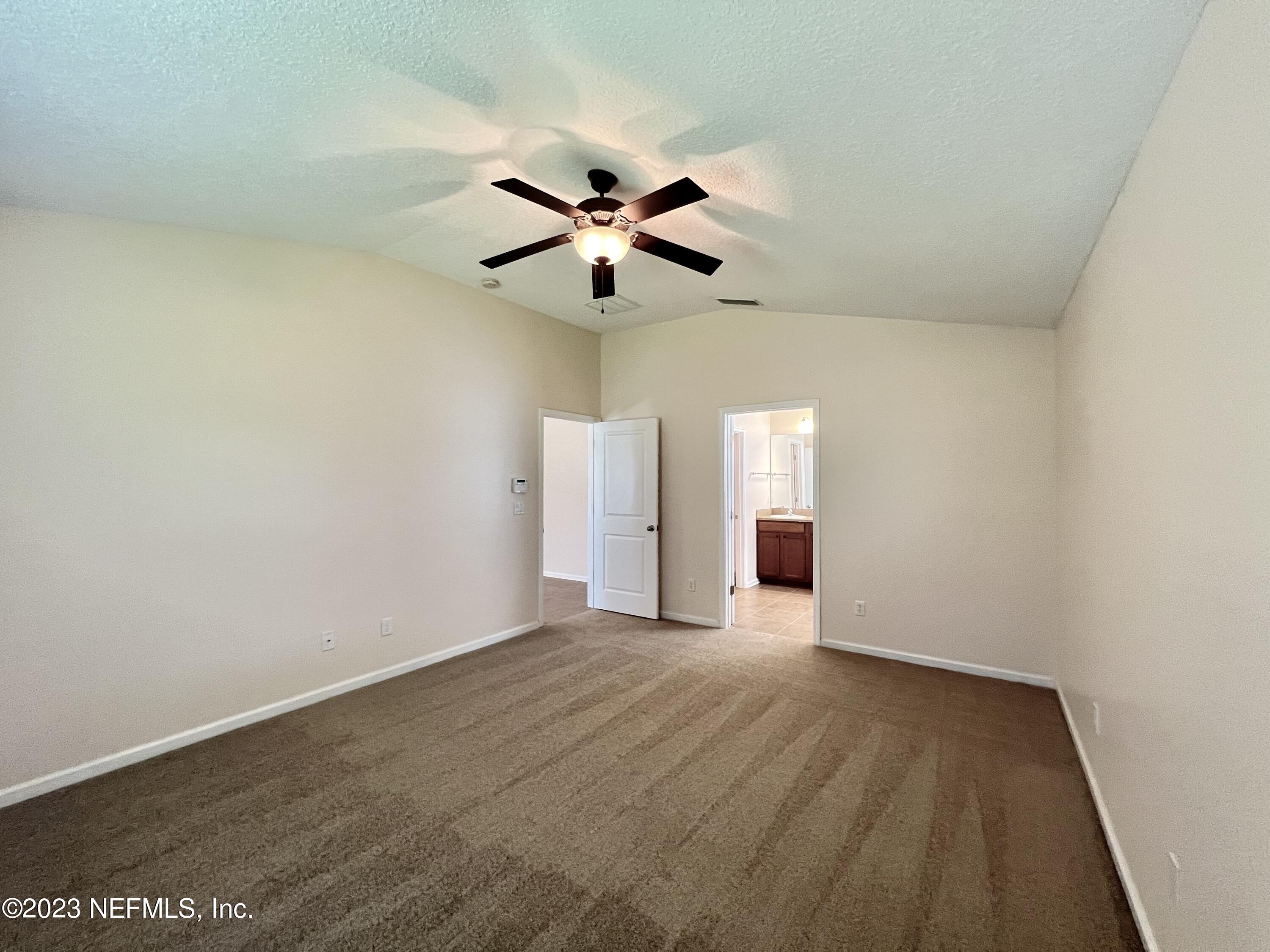 120 East Franchetta Lane St. Augustine, FL 32092 - Photo 3 of 25 wooden floor in an empty room