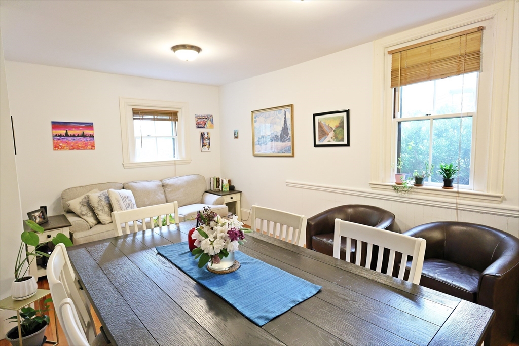 107 Waban Hill Road, Unit R Newton, MA 02467 - Photo 8 of 21 a living room with furniture and a wooden floor
