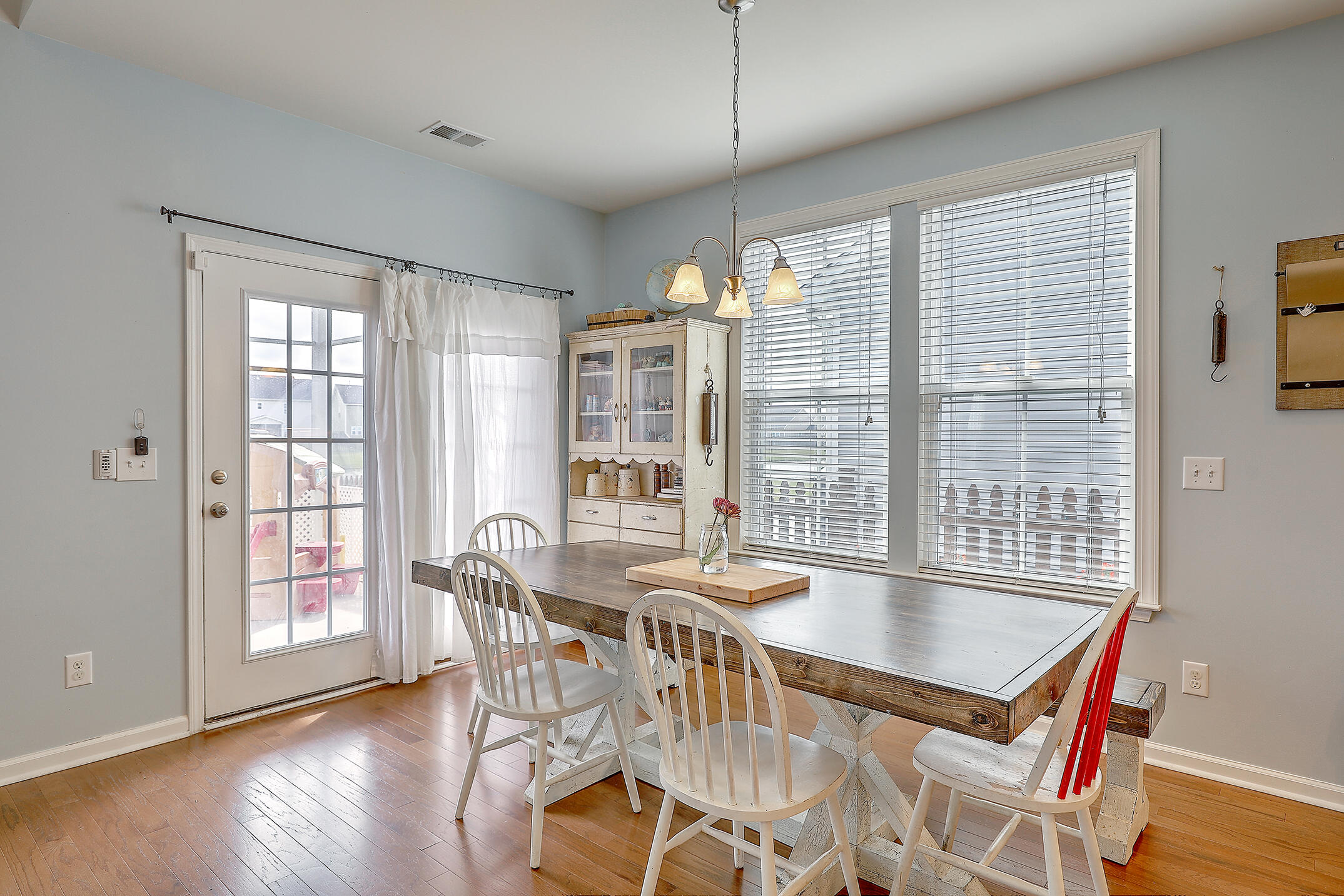 218 Spectrum Road Summerville, SC 29486 - Photo 10 of 35 Eat in area and screened porch