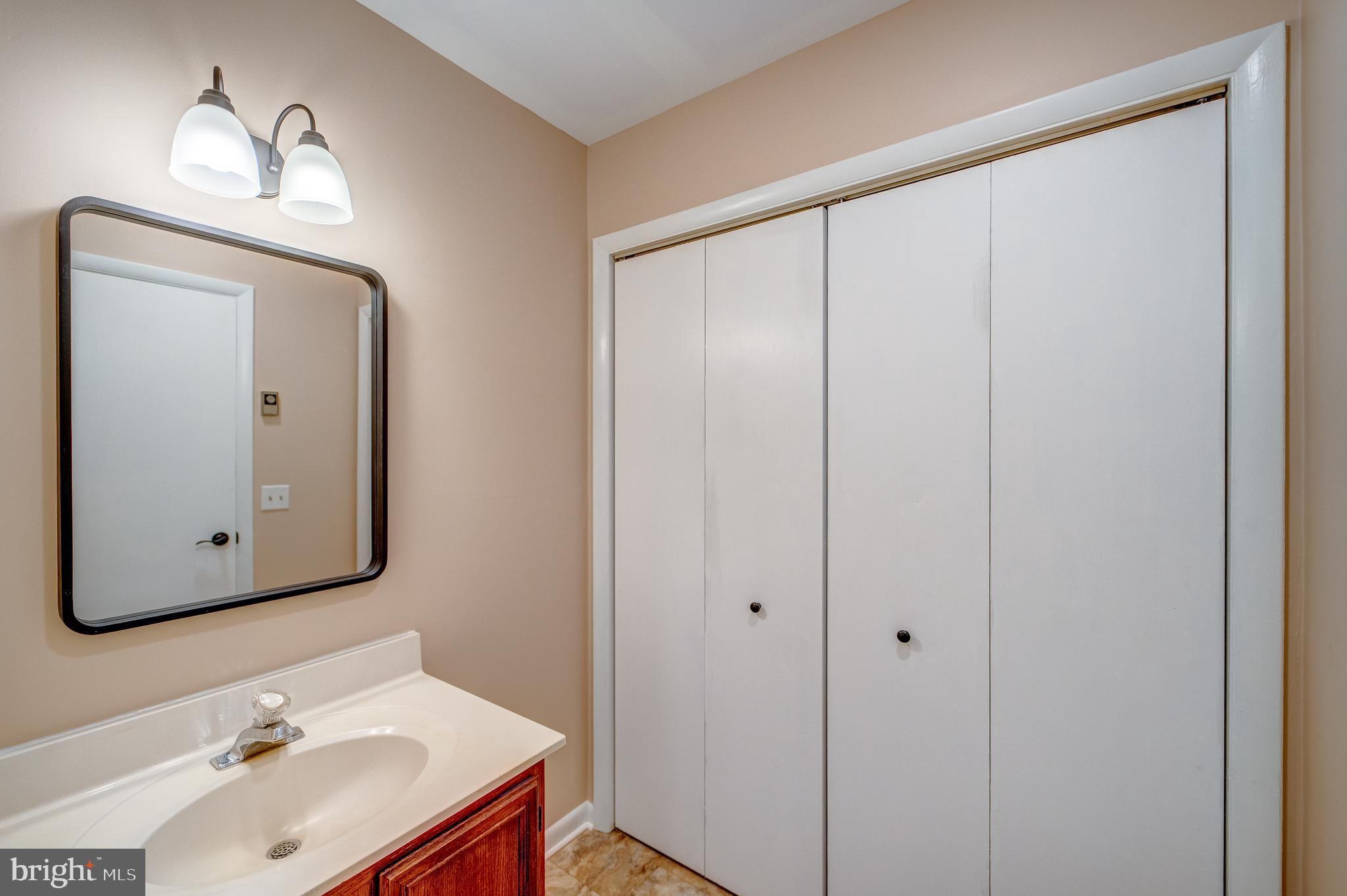 205 Newtown Road Chester, MD 21619 - Photo 48 of 53 Hall full Bathroom with washer /dryer