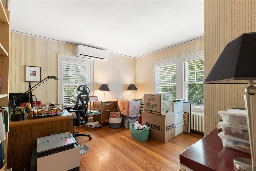 114 South Border Road Medford, MA 02155 - Photo 23 of 36 a living room with furniture and a flat screen tv