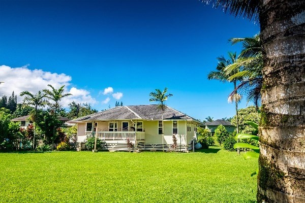 418 Puuopae Road, Unit A Kapaa, HI 96746 - Photo 3 of 25 a front view of a house with garden
