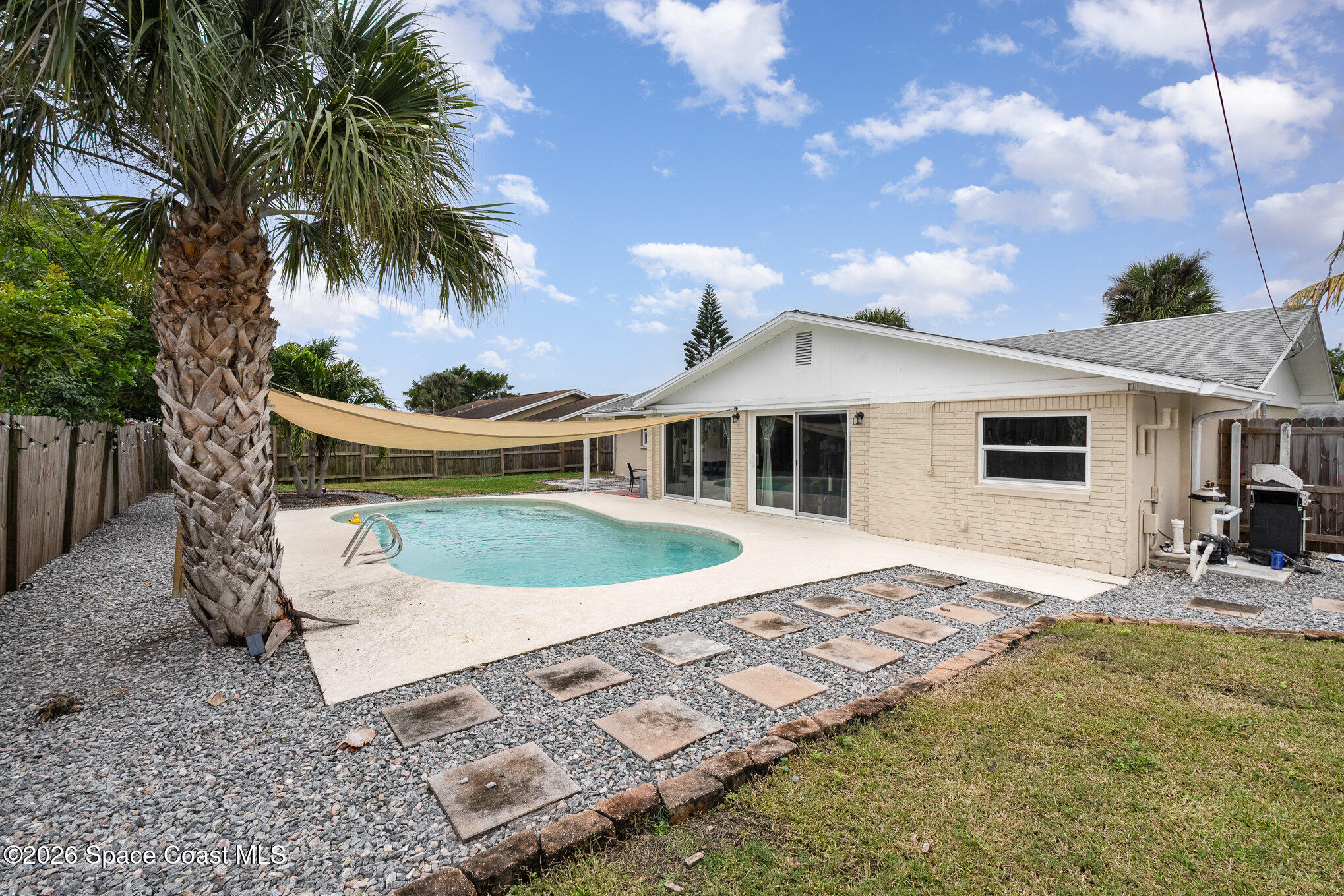800 1st Street Merritt Island, FL 32953 - Photo 25 of 28 a view of a house with backyard and sitting area