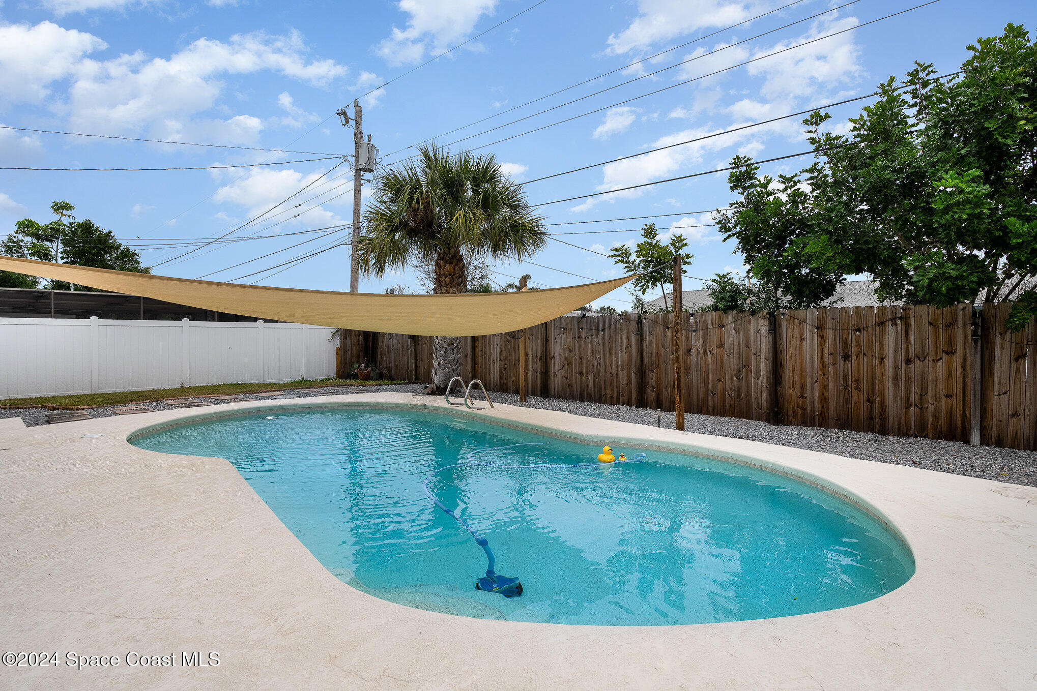 800 1st Street Merritt Island, FL 32953 - Photo 27 of 28 a view of outdoor space and swimming pool