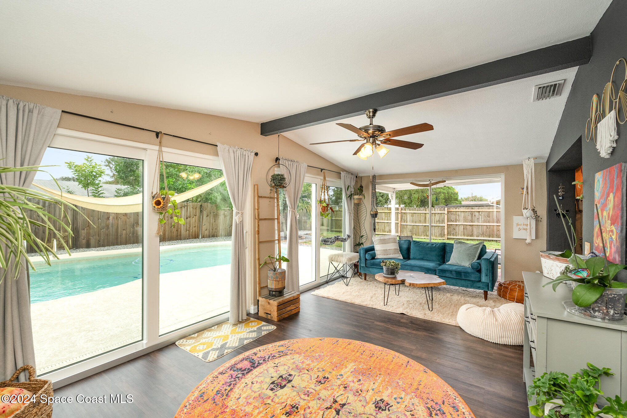 800 1st Street Merritt Island, FL 32953 - Photo 5 of 28 a living room with couch and a large window