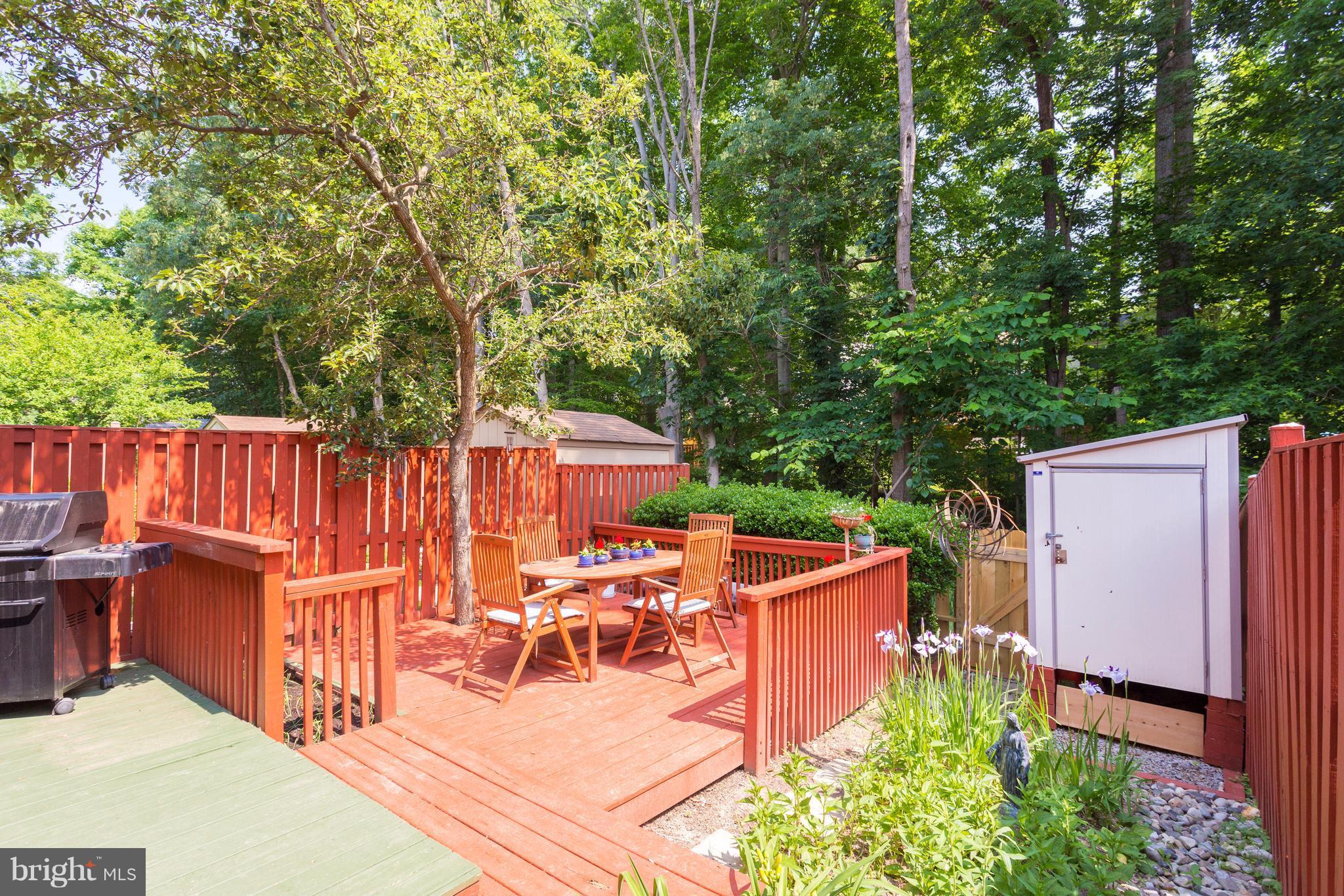 6571 Forest Dew Court Springfield, VA 22152 - Photo 17 of 20 an outdoor space with seating