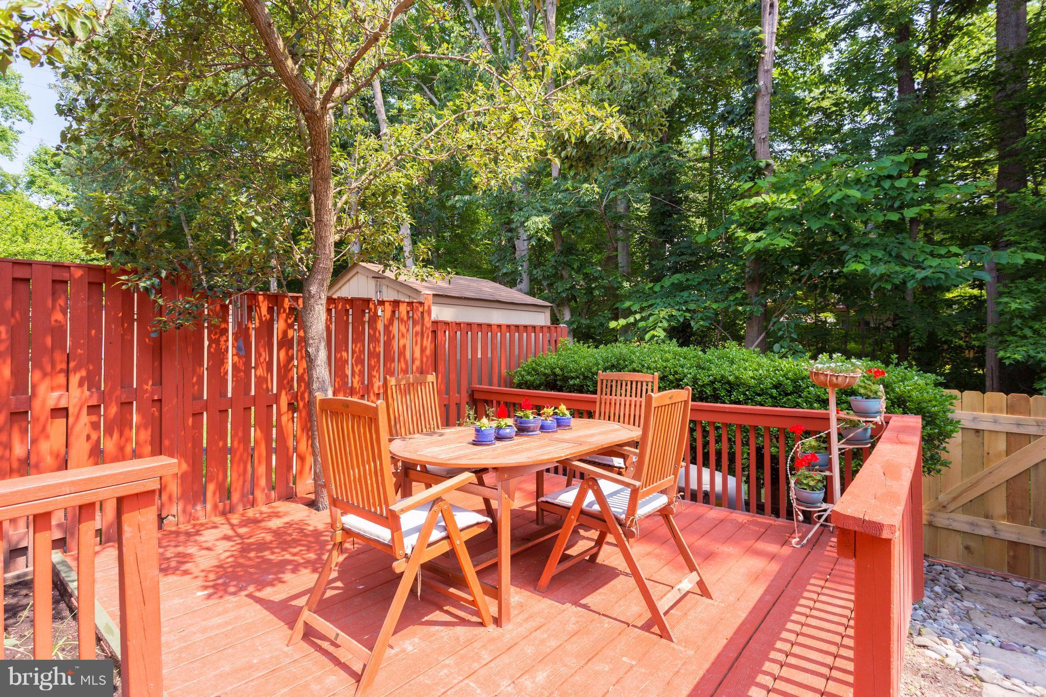 6571 Forest Dew Court Springfield, VA 22152 - Photo 18 of 20 a view of a chairs and table in patio