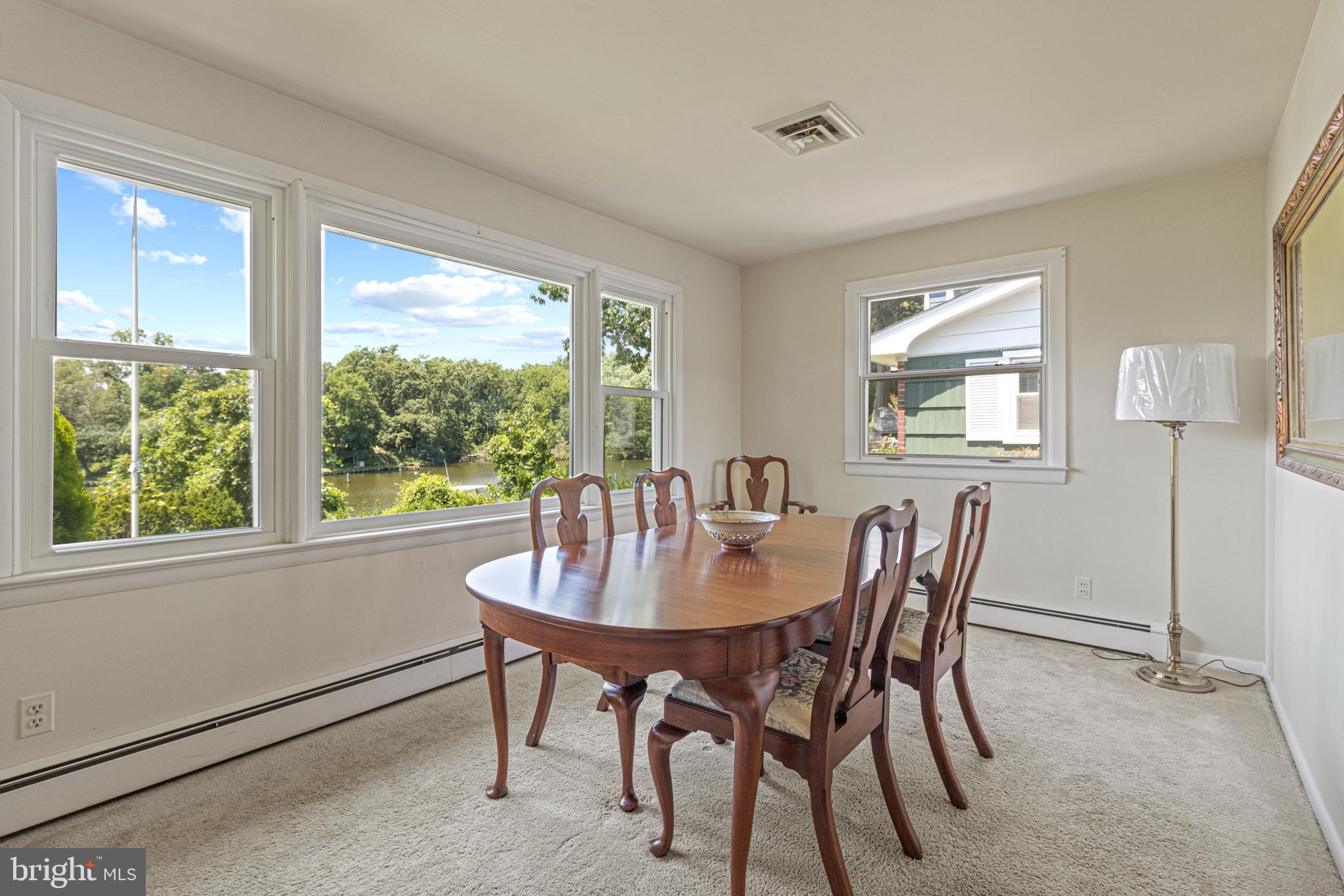 216 Riverside Road Edgewater, MD 21037 - Photo 16 of 35 Dining area overlooking Warehouse Creek