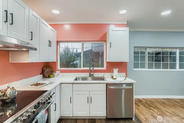 a vase of flowers sitting on a table