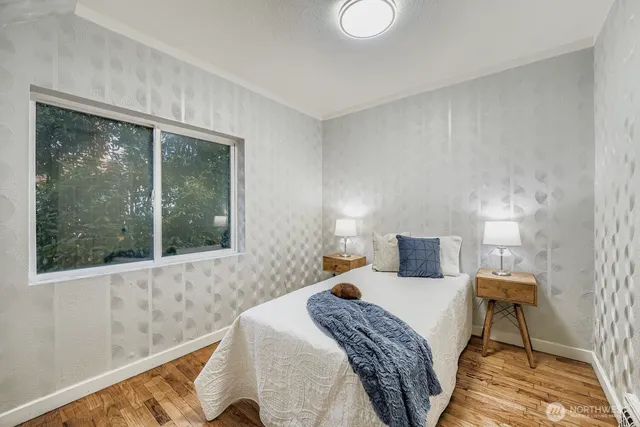 a bathroom with a sink toilet and a mirror