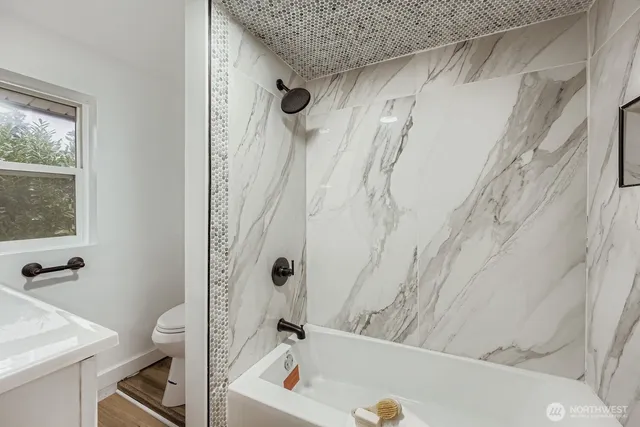 a bathroom with a sink a vanity and a mirror