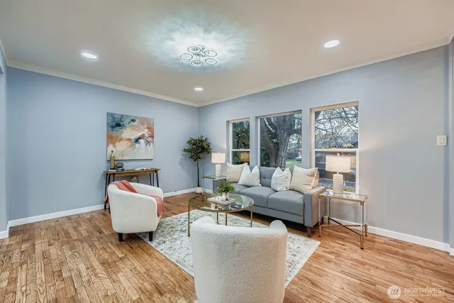a living room with furniture and a rug