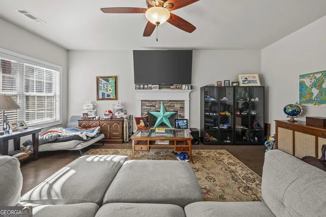a view of a balcony with wooden fence