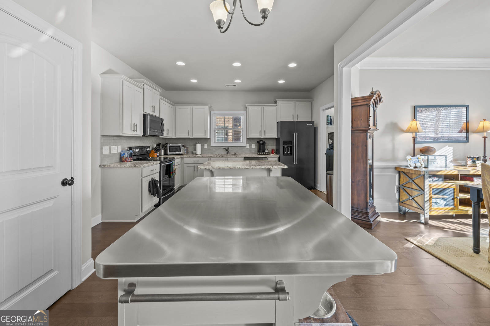 381 Township Lane Athens, GA 30606 - Photo 27 of 68 a kitchen with stainless steel appliances granite countertop a sink a stove and a refrigerator