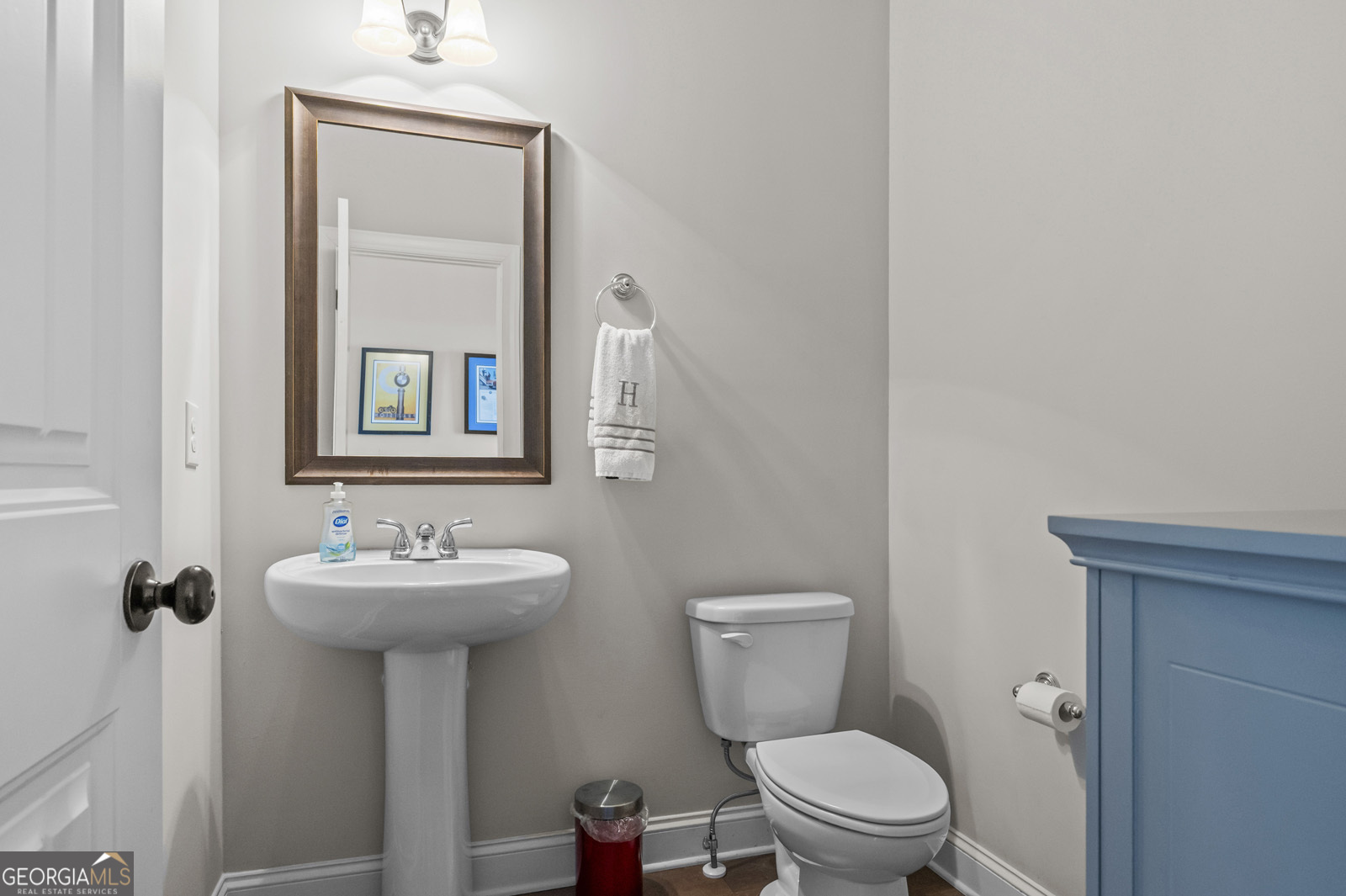 381 Township Lane Athens, GA 30606 - Photo 35 of 68 a bathroom with a toilet sink and mirror