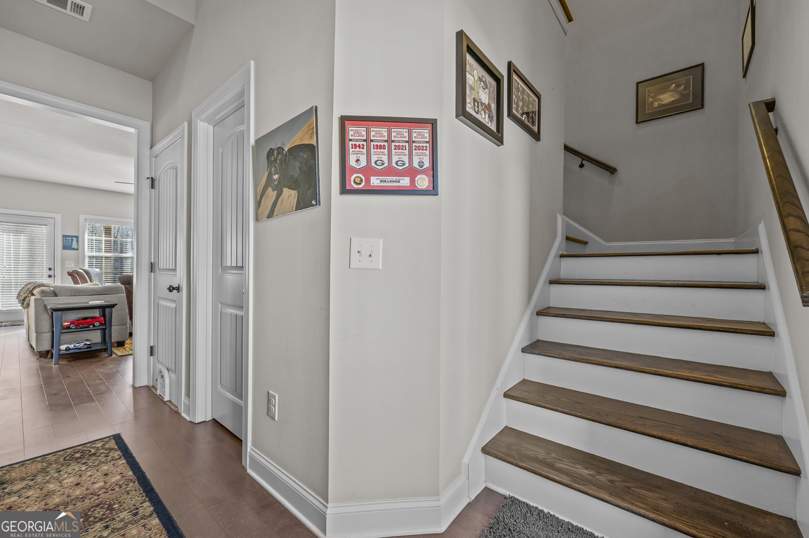 381 Township Lane Athens, GA 30606 - Photo 36 of 68 a view of a hallway with wooden floor and windows