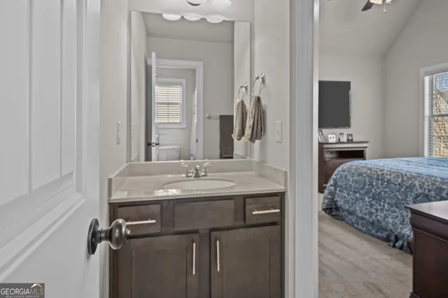a view of a livingroom with furniture and windows