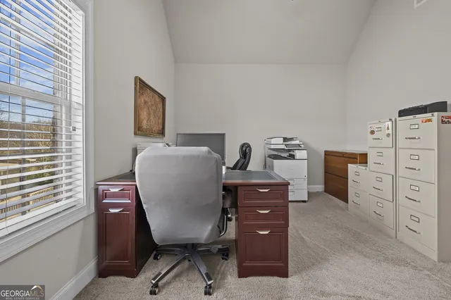 a bed room with a bed and a couch