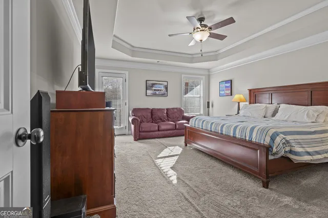 a view of a livingroom with furniture