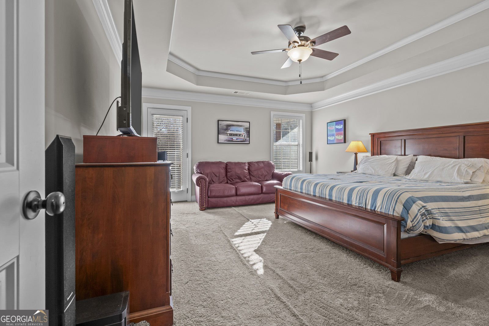 381 Township Lane Athens, GA 30606 - Photo 47 of 68 a bedroom with a bed and a chandelier