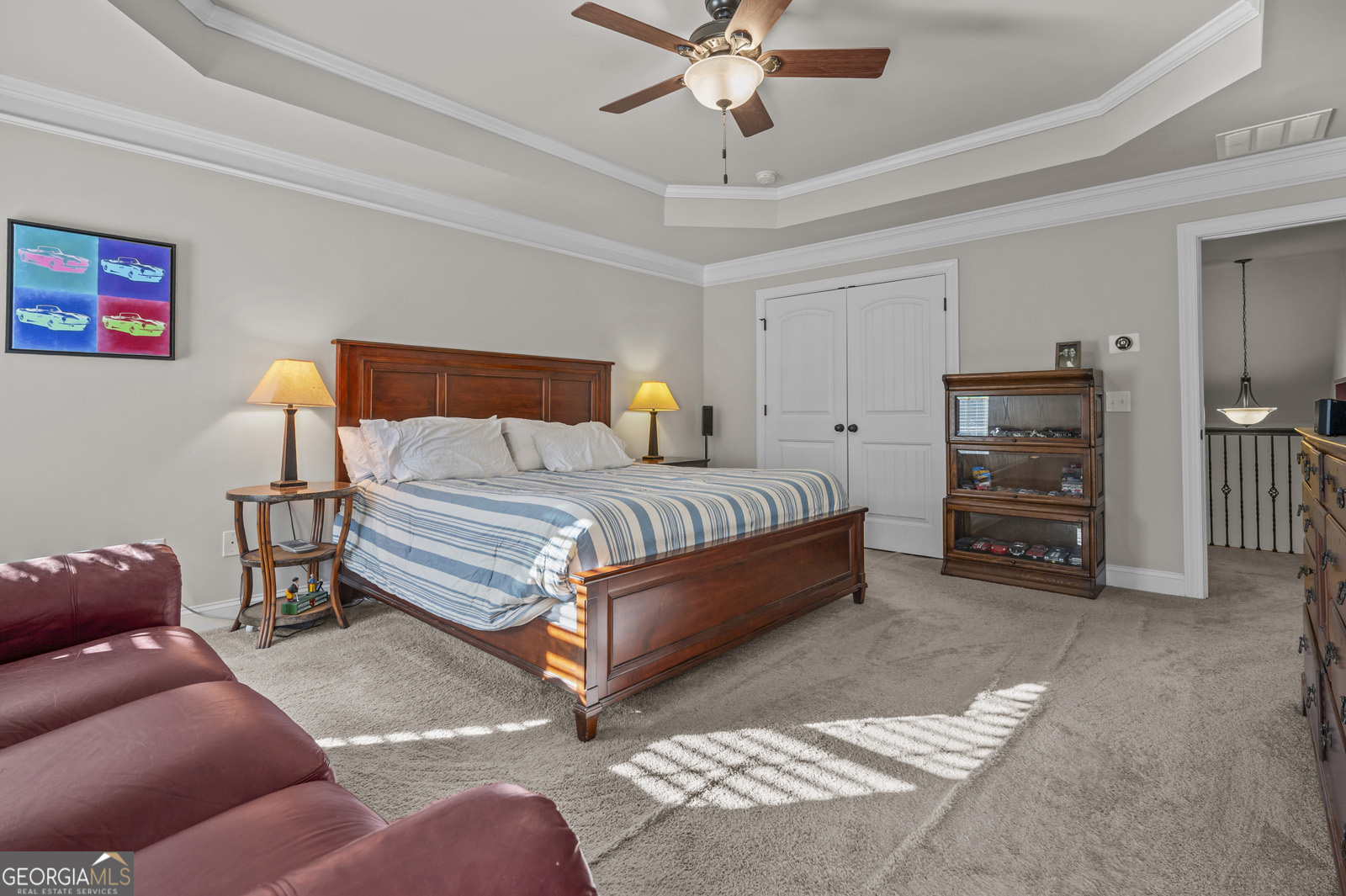 381 Township Lane Athens, GA 30606 - Photo 48 of 68 a bedroom with a bed and a chandelier