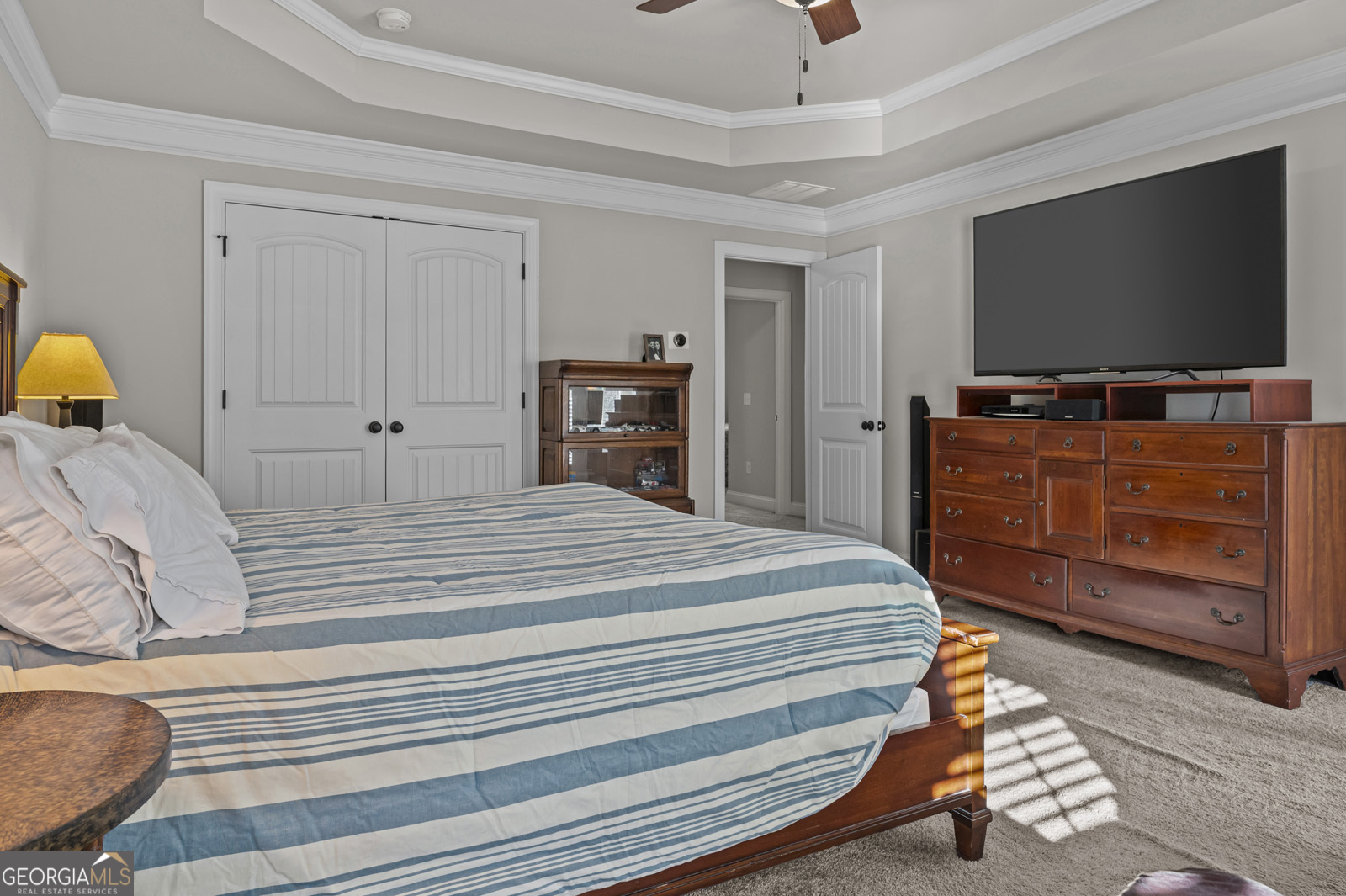 381 Township Lane Athens, GA 30606 - Photo 50 of 68 a bedroom with a bed and a flat screen tv