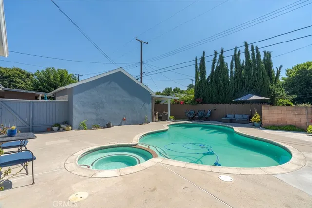 a house view with a backyard space