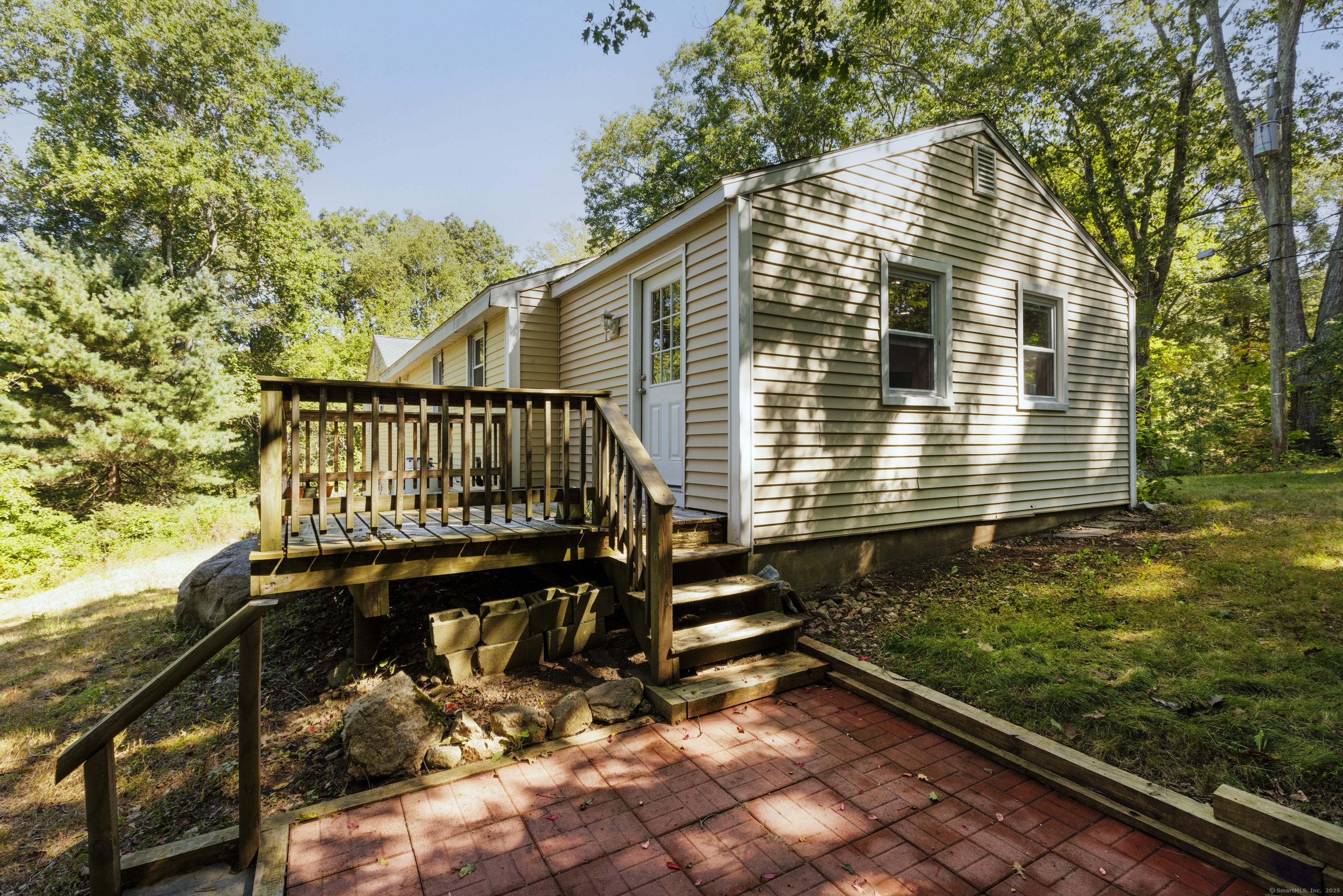 239 A Rockledge Road Lyme, CT 06371 - Photo 26 of 30 a front view of a house with garden