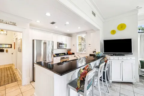 a kitchen with sink and window