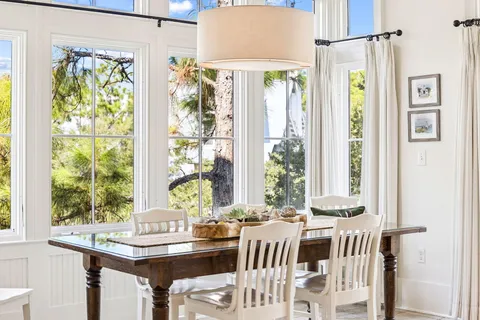 a kitchen with stainless steel appliances a stove a microwave and cabinets