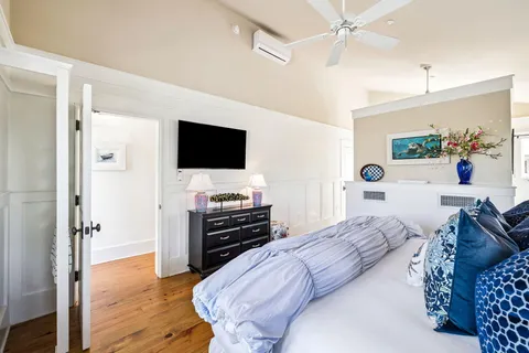 a bathroom with a sink and a shower curtain