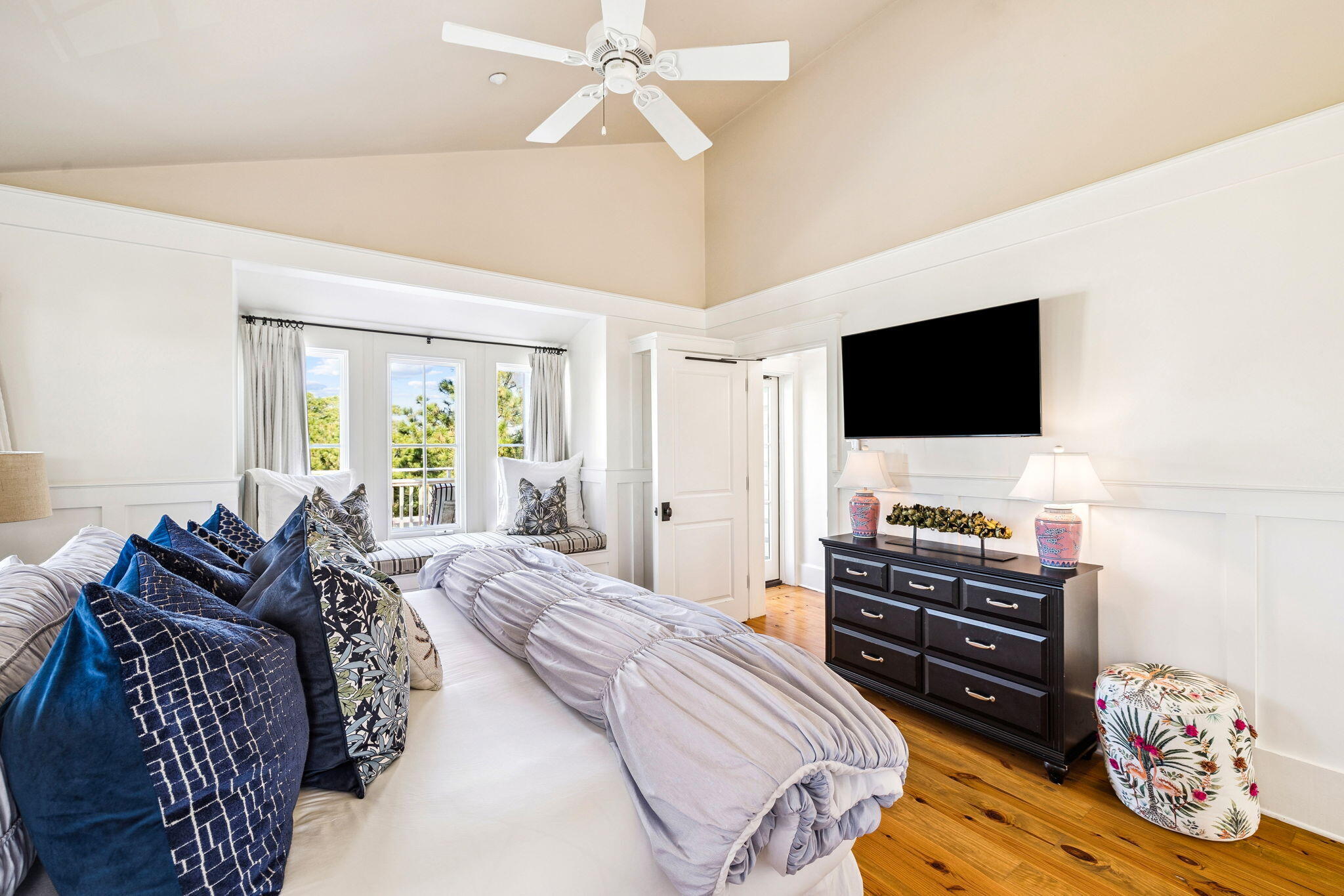 1640 East County Highway 30A, Unit 302 Santa Rosa Beach, FL 32459 - Photo 28 of 64 a bedroom with a bed and flat screen tv