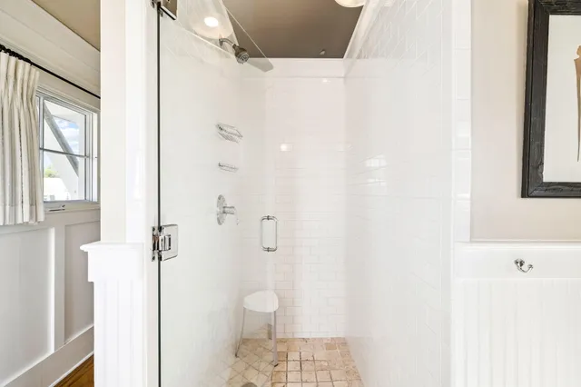 a view of a bathroom with a sink and mirror
