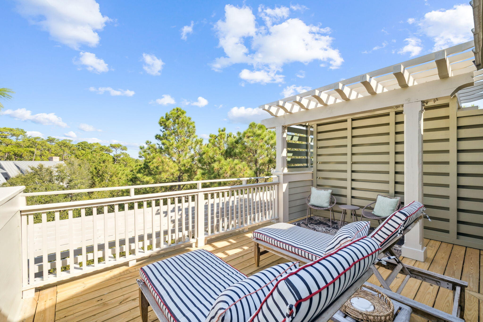 1640 East County Highway 30A, Unit 302 Santa Rosa Beach, FL 32459 - Photo 36 of 64 a view of a balcony with wooden floor