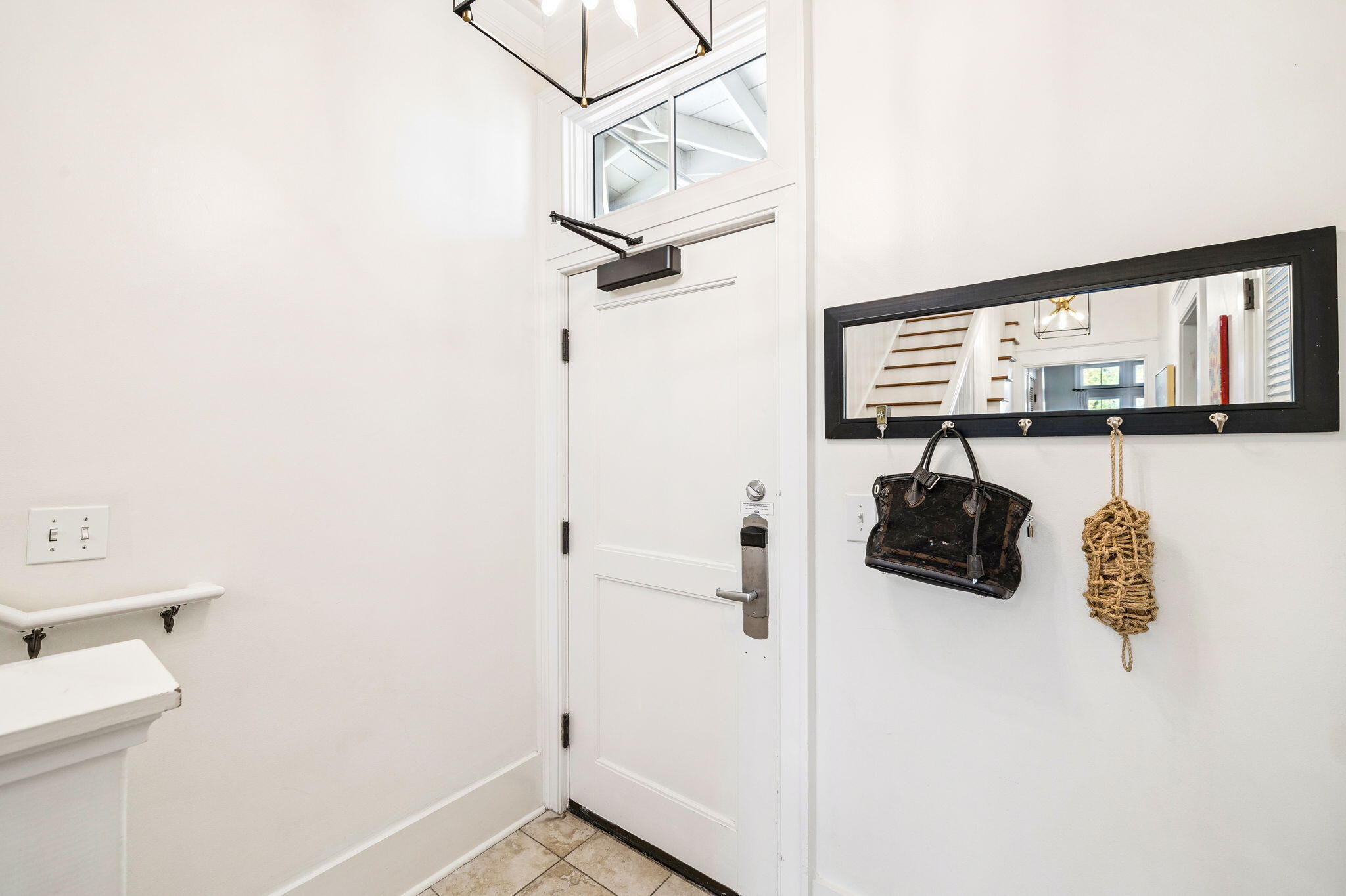 1640 East County Highway 30A, Unit 302 Santa Rosa Beach, FL 32459 - Photo 44 of 64 a view of a bathroom with a sink and mirror