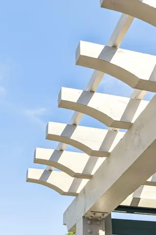 a view of swimming pool is middle in the middle of a yard