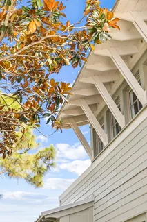 a view of a swimming pool with outdoor seating space