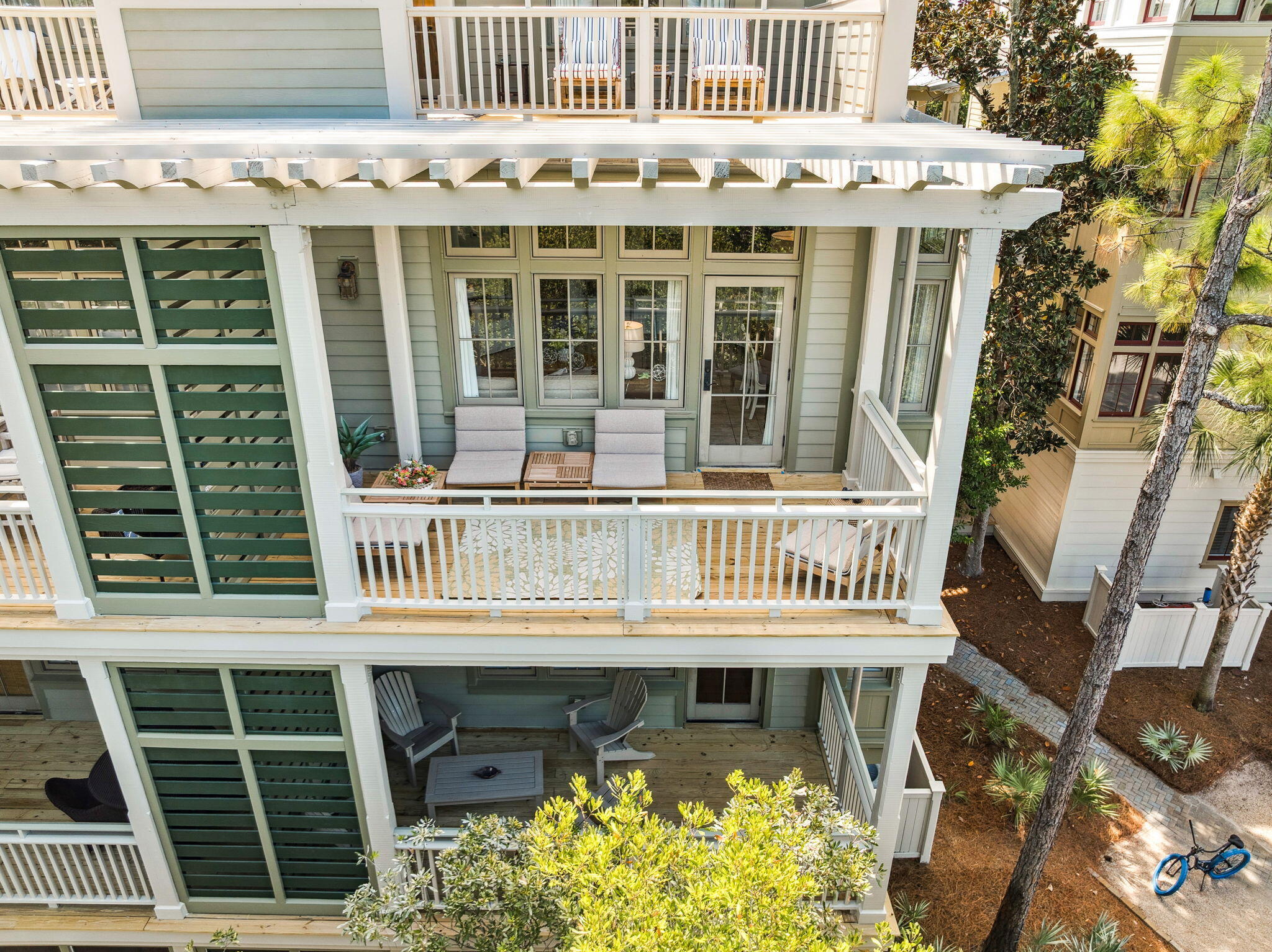 1640 East County Highway 30A, Unit 302 Santa Rosa Beach, FL 32459 - Photo 56 of 64 a front view of a house with a porch