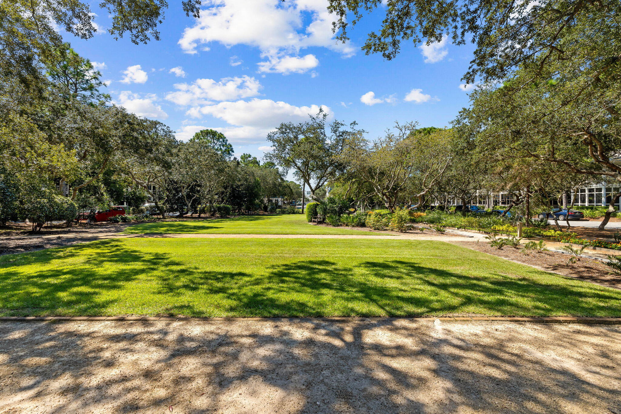 1640 East County Highway 30A, Unit 302 Santa Rosa Beach, FL 32459 - Photo 60 of 64 a view of swimming pool is middle in the middle of a yard