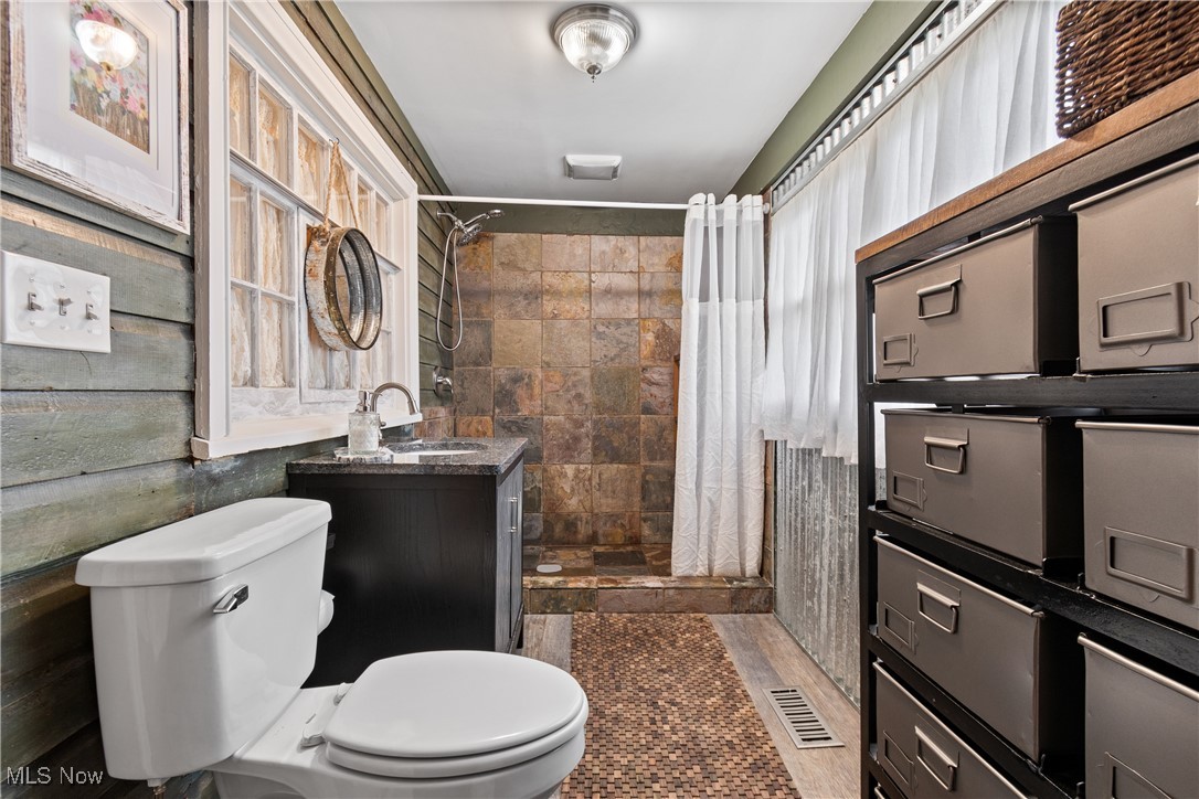 4786 Mayfair Road North Canton, OH 44720 - Photo 15 of 38 Full bathroom featuring a shower stall and vanity