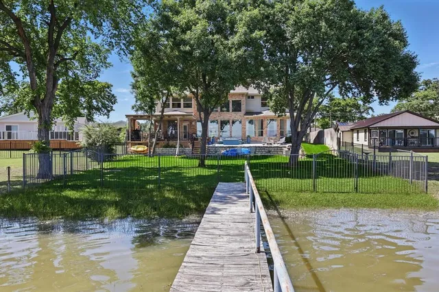 a house with garden in front of it